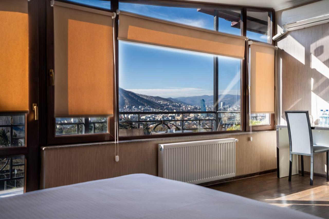 Siberia Hotel Τυφλίδα Εξωτερικό φωτογραφία A room at the hotel