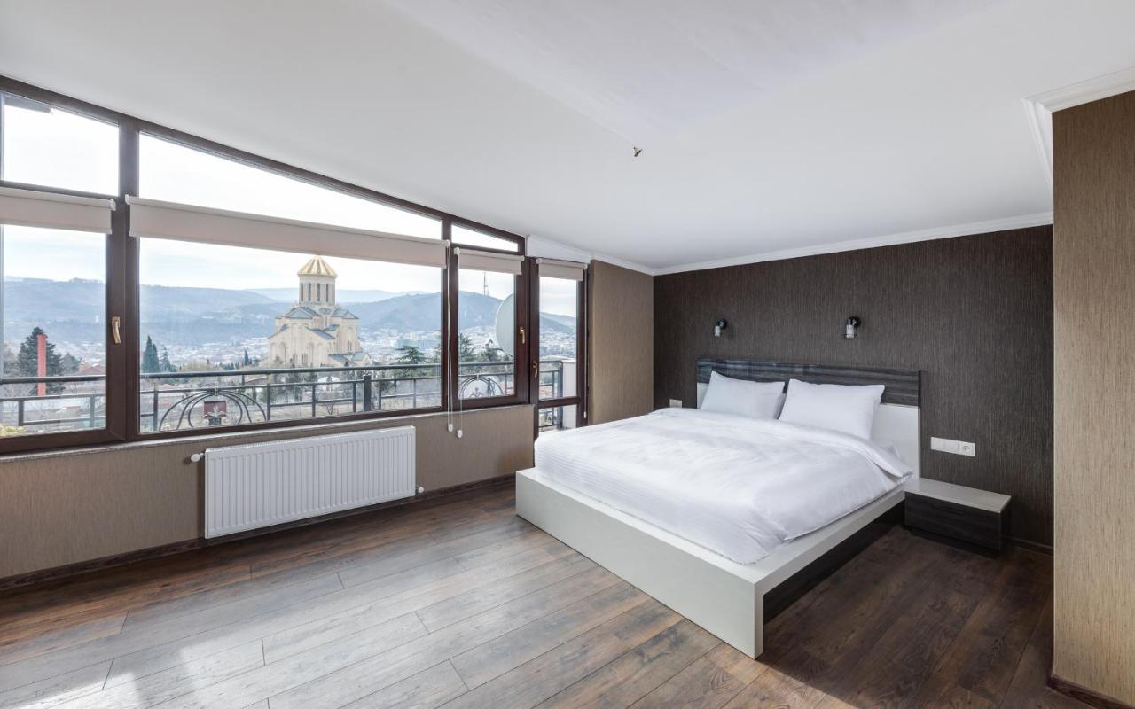 Siberia Hotel Τυφλίδα Εξωτερικό φωτογραφία A bedroom at the hotel